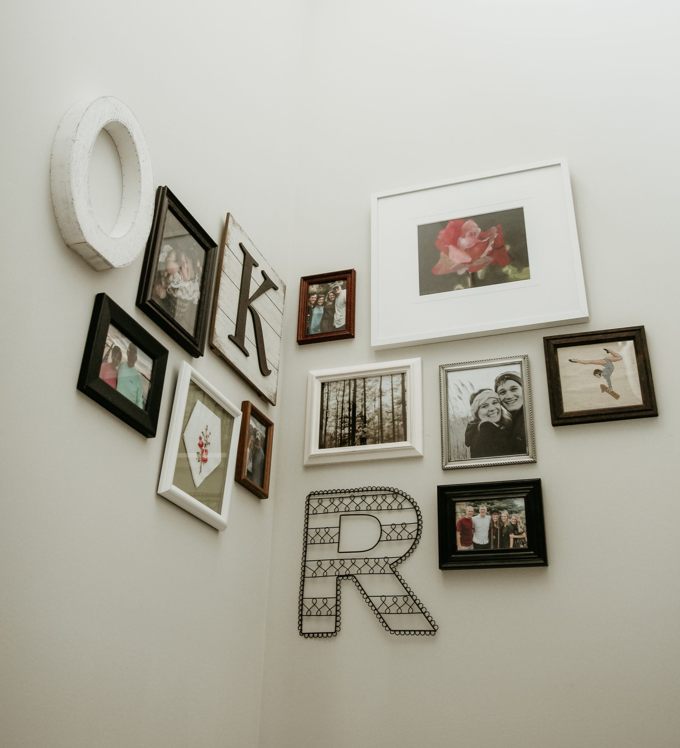 A gallery wall of custom framed photos at home